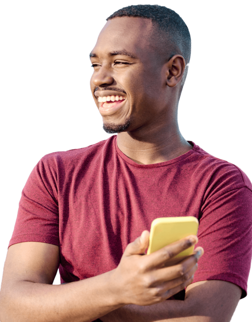 Happy Young Man Holding Phone